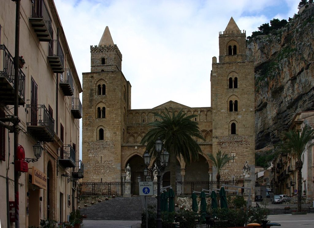 The Romanesque facade of the Norman cathedral with its two towers