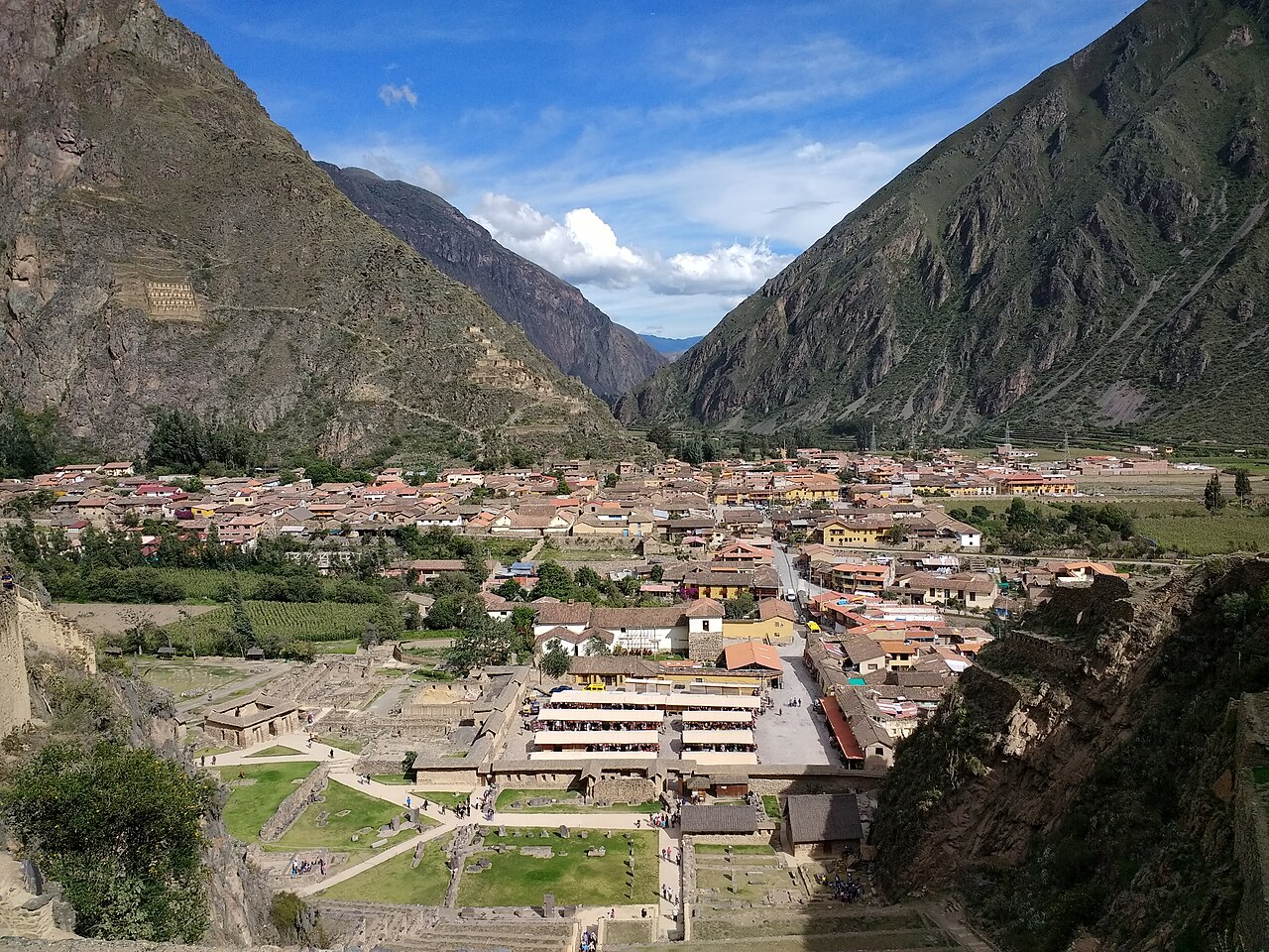 View over the town of Ollantaytambo Peru between steep mountains