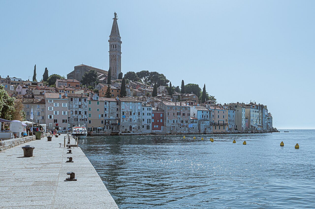 Boats moored in Valdibora harbor below the church tower