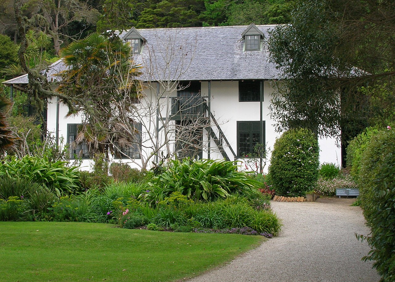 White Pompallier Mission house and green lawn in Russell New Zealand
