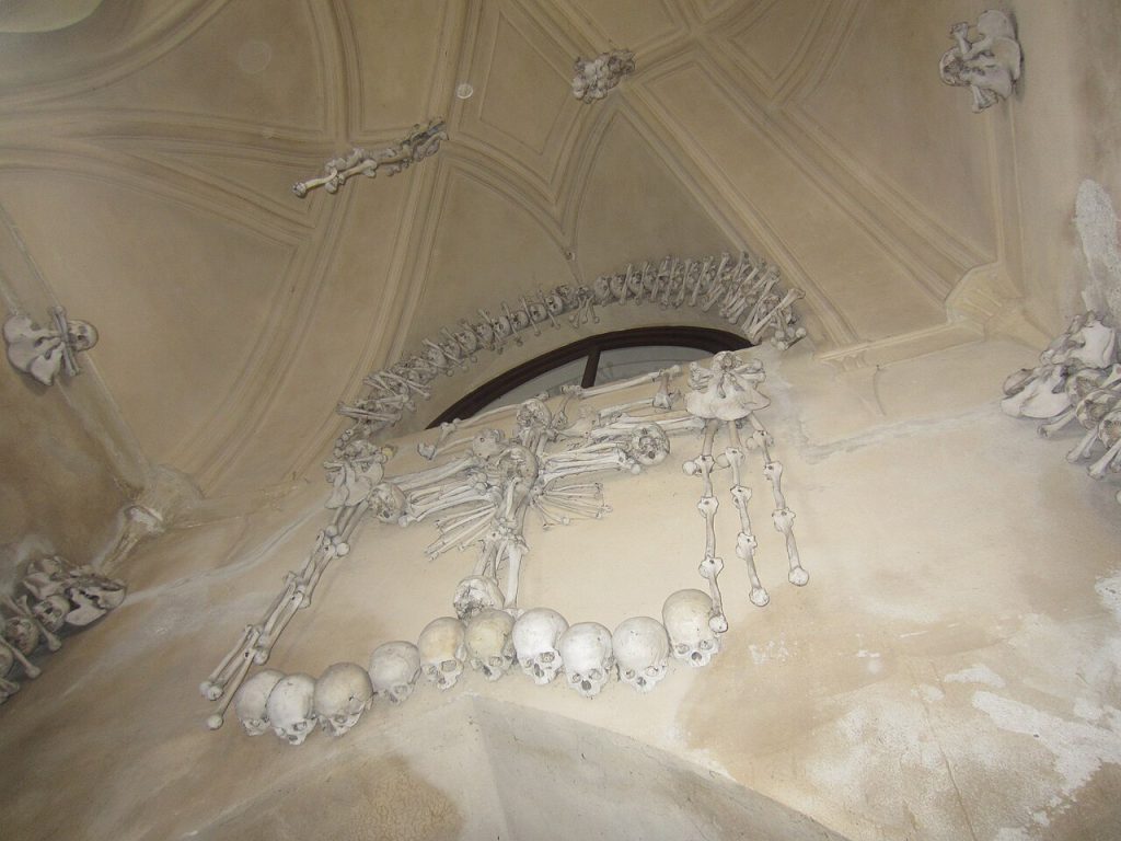 Bone chandelier and garlands inside the Sedlec Ossuary
