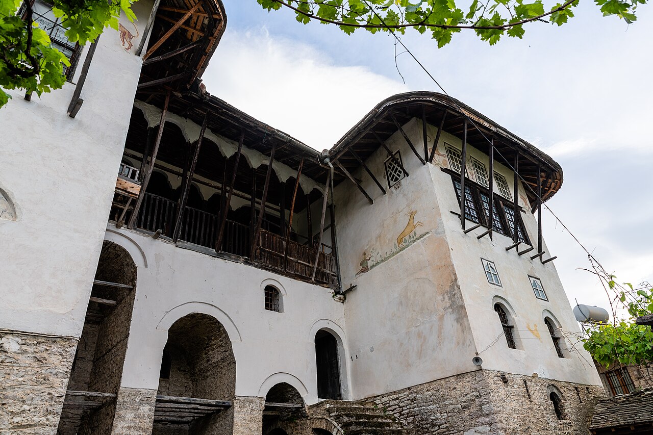 Tall Ottoman tower house with many windows and a stone roof