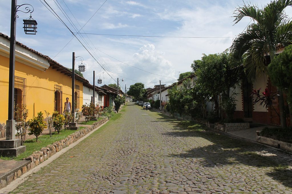 Cobblestone street with colonial houses