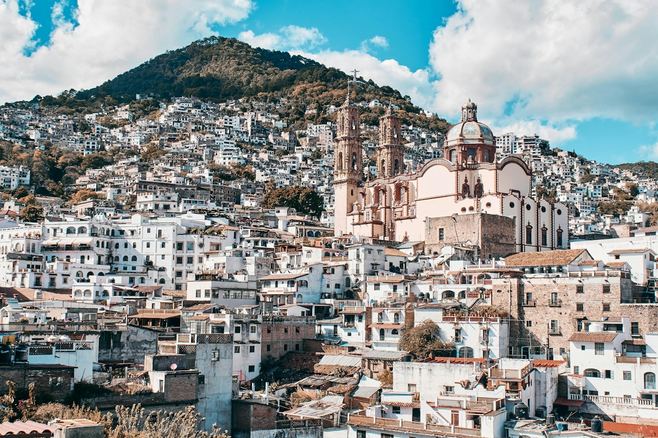 White buildings with red roofs on a hillside