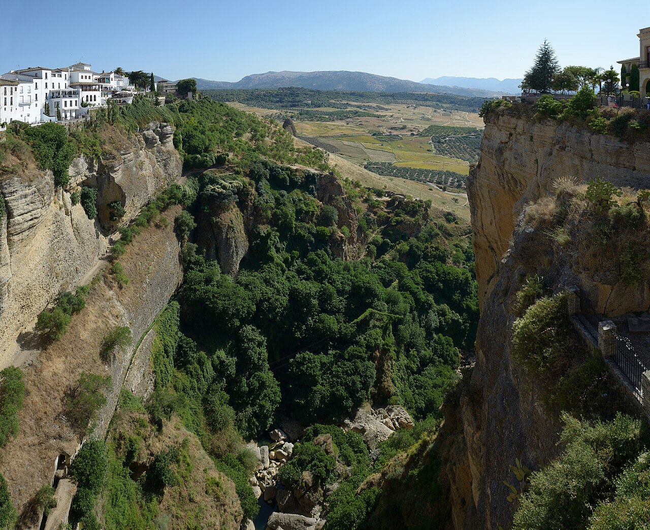 View over the gorge and countryside from the Puente Nuevo in Ronda Spain
