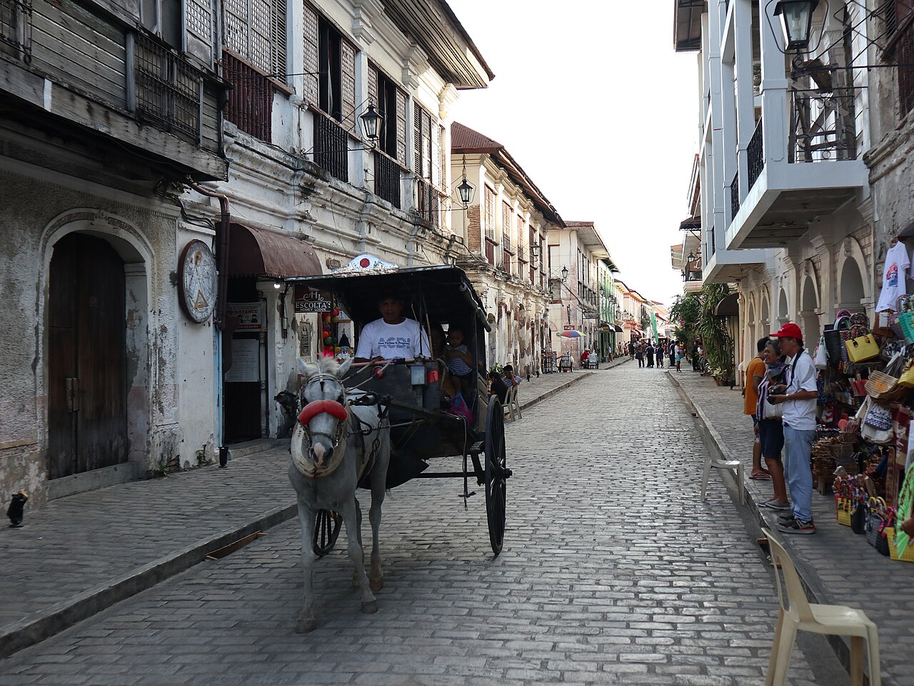 Horse-drawn kalesa on a cobbled street in Vigan Philippines