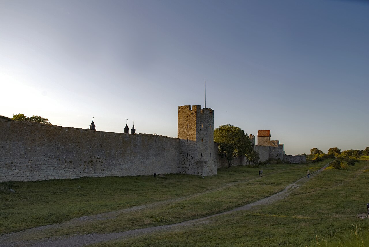 Medieval stone ring wall and towers of Visby Sweden at sunset
