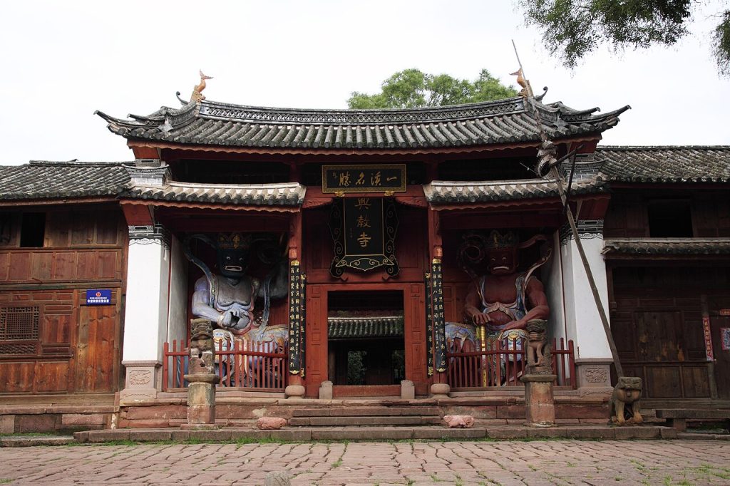 Red wooden gate of Xingjiao Temple